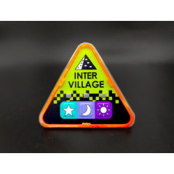 Monero Orange, Intervillage Badge front