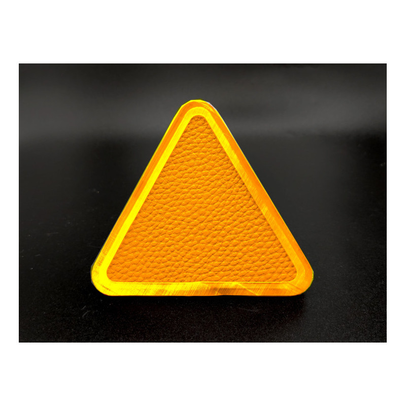 Monero Orange, Intervillage Badge back